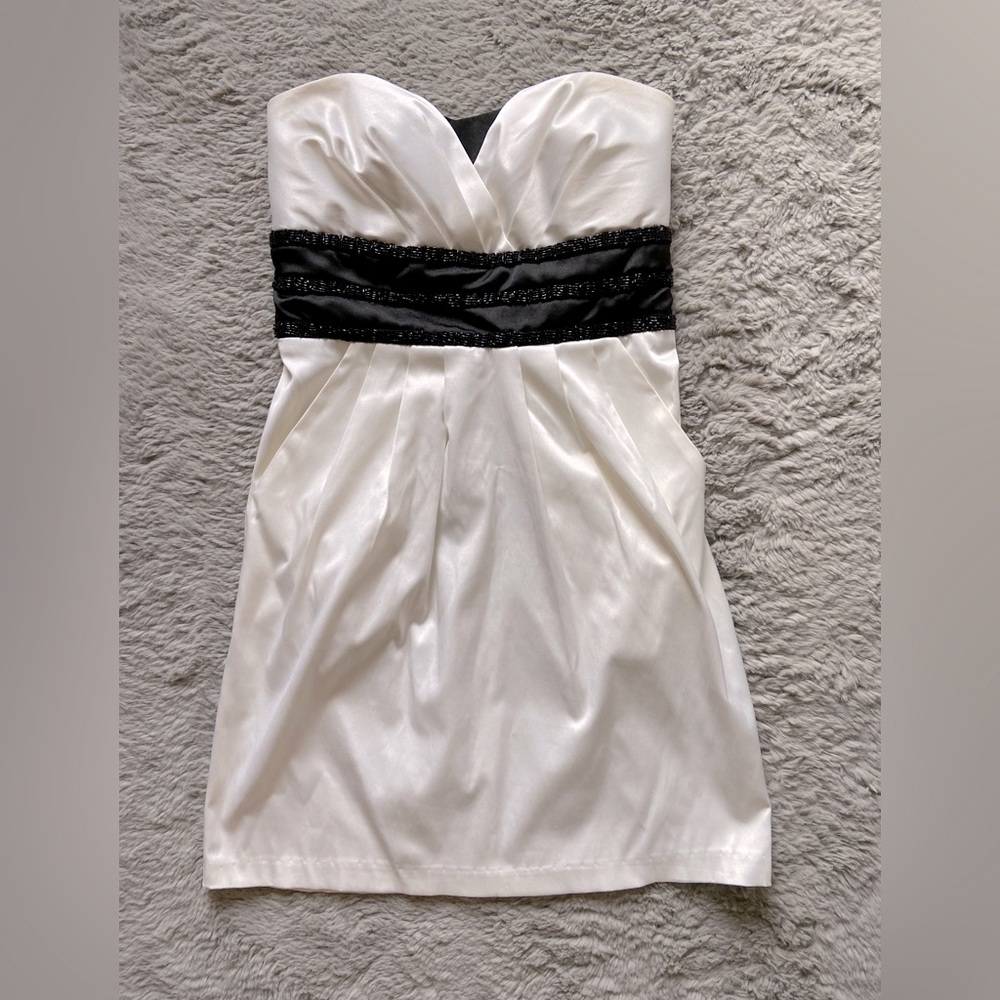 Semi-formal cocktail dress in black and white with beading